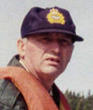 A person wearing a hat
Description automatically generated